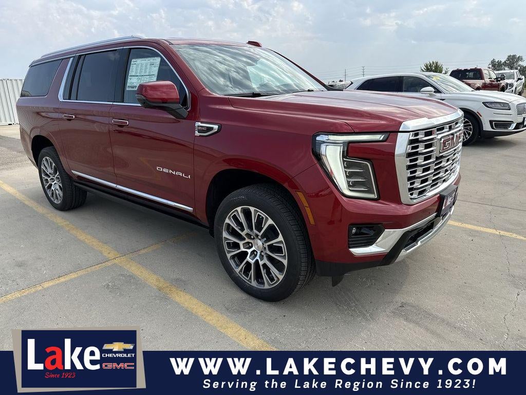 2026 GMC Yukon XL Denali in Volcanic Red Tintcoat — front three-quarter view