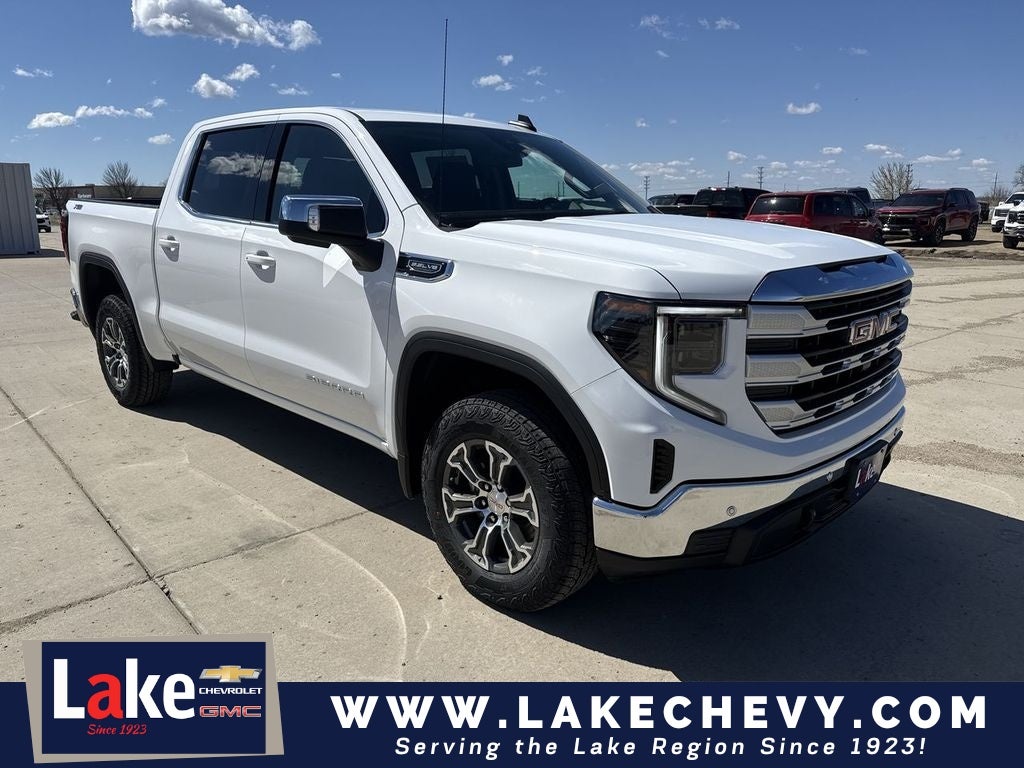 2026 GMC Sierra 1500 SLE in Summit White — front three-quarter view